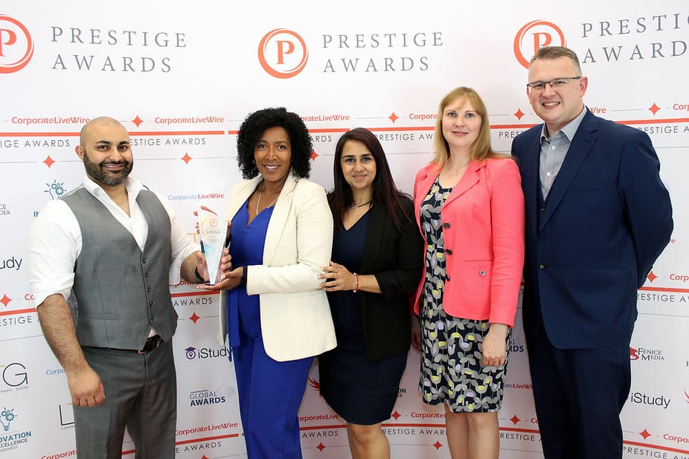 RG Law team receiving Law Firm of the Year award